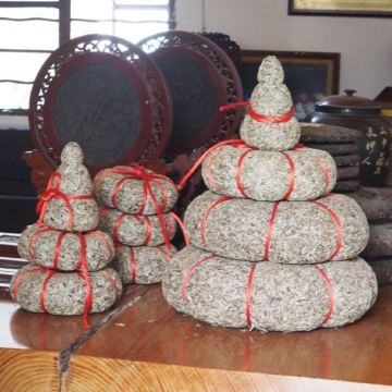 一坨坨儿～^_^vv普洱茶 基诺山寨